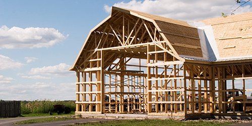Frame work of farm house. Farm Mortgage Loans available at West Iowa Bank